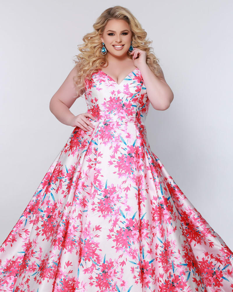 Front of a model wearing a size 32 Wild Flower Formal Dress in Pink Blossom by Celebrations by Sydney's Closet. | dia_product_style_image_id:340283